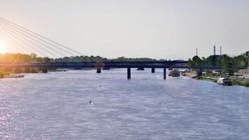 Warsaw, Poland. 11 April 2024. The Swietokrzyski Bridge over the Vistula river. photo