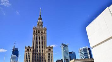 Warsaw, Poland. 11 April 2024. View Palace of Culture and Science and downtown business skyscrapers, city center. photo