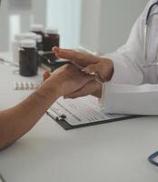 Homecare nursing service and elderly people cardiology healthcare. Close up of young hispanic female doctor nurse check mature caucasian man patient heartbeat using stethoscope during visit photo