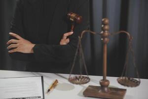 Law theme, gavel or mallet of the judge, lawyer enforcement officers, evidence-based cases taken into account in the court abount business, legislation. photo