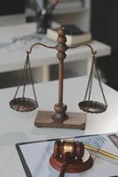 Law theme, gavel or mallet of the judge, lawyer enforcement officers, evidence-based cases taken into account in the court abount business, legislation. photo