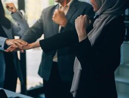 Group of businesspeople meeting in office. Teamwork of business. photo