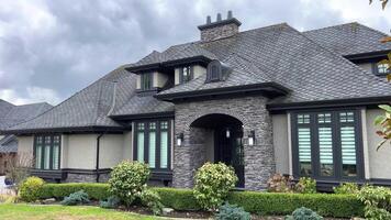 beautiful new house in city of Surrey near Vancouver Canada private sector no people clouds picture like from visualization magazine desire to have such mansion street trees built two-story cottage video