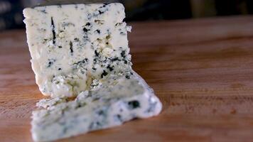 piece of roquefort cheese, food closeup video