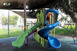 Items for games and sports on the playground in the city park. photo