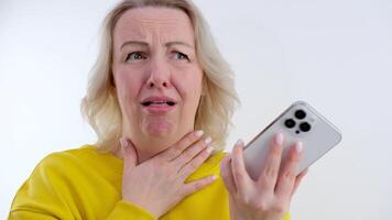 woman has bitter taste in mouth metallic taste a cough woman holds a phone by the throat in her hands. call the doctor. tears in the eyes hard to swallow get sick cold problems with the gallbladder video