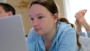 Two Hispanic Children Looking at Laptop video