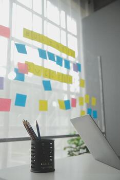 Studio workspace with laptop computer and office supplies. Work from home. With copy space photo