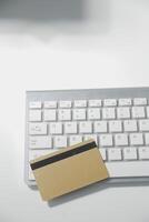 Calculator on a dark background, plastic cards and banknotes photo