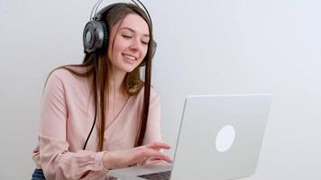 Business people wearing headset working in office to support remote customer or colleague. Call center, telemarketing, customer support agent provide service on telephone conference call. video
