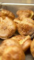 Traditional English Yorkshire pudding rotating on white background video