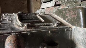 old tank in the castle of gerakaster close-up camera passes filming it on the stone floor in ancient times iron cannon video