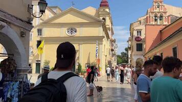 Corfu, Greece 01 Sep, 2023 The tourists are in cafes and restaurants in Liston square during summer vacation hollidays, 60 motion video