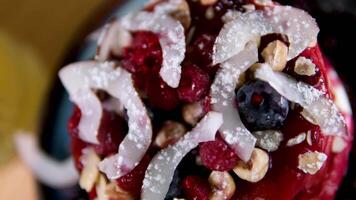 Pancakes with coconut flakes, red cherry jam and berries. Pancakes with berry syrup video