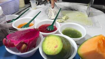 Art of making thai fruit ice cream in the street video