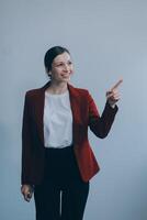 Happy young businesswoman on white background photo