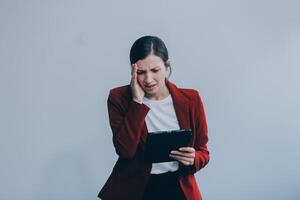 Image of sad office girl, Caucasian woman isolated sulking and frowning disappointed, standing upset white background. photo