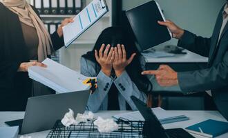 Stressful business man have so many paperwork in the office photo