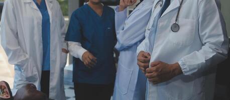 Group of Doctors and nurses coordinate hands to trust. Concept Teamwork healthy and medical in hospital photo