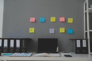 Studio workspace with laptop computer and office supplies. Work from home. With copy space photo