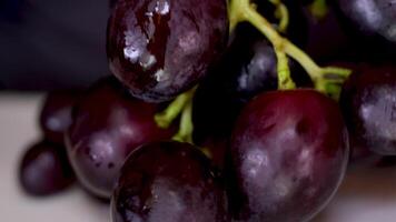 Black Grapes in Extreme Closeup, Handheld Shot video