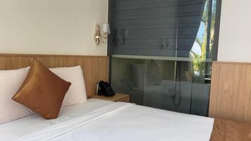 light switches on and off in the bedroom in Hotel. Hotel located, close to tourist sites and near the sea video