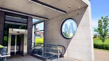 Warsaw, Poland. 3 May 2024. Second line of Warsaw Subway system. The entrance of a subway station. Warsaw Szwedzka photo