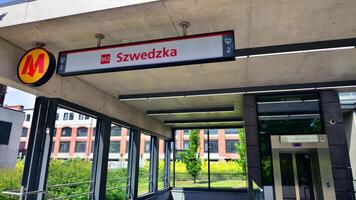 Warsaw, Poland. 3 May 2024. Second line of Warsaw Subway system. The entrance of a subway station. Warsaw Szwedzka photo