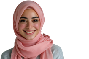 feliz muçulmano mulher dentro Rosa hijab, alegremente sorrisos às Câmera, posando em isolado transparente fundo png