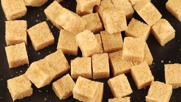 Brown cane sugar in cubes video
