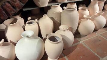 Many earthenware jugs for wine. Georgia video