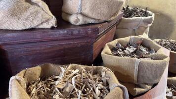 Bag of dried herbs Bags and basket of colorful herbs and spices in the market of Egypt video