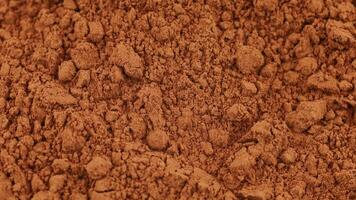 en massa av kakao pulver närbild. kakao bakgrund eller textur. video