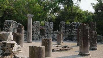 Butrint or Butrinto Ruins of the Great Basilica in Butrint National Park, Buthrotum, Albania. Triconch Palace at Butrint Life and death of ancient Roman house Historical medieval Venetian Tower video