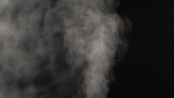 Water vapor on black close-up. white water vapor with spray video