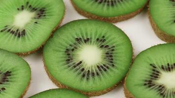 rebanado kiwi. kiwi textura o antecedentes. textura de kiwi video