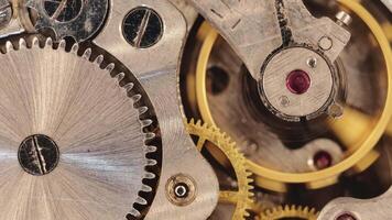 clock mechanism close-up. Inside the clock. close up of cogwheels in clockwork video