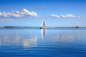 Sailboat drifting lazily on calm lake, its sails billowing in the gentle summer breeze photo