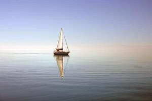 Sailboat drifting lazily on calm lake, its sails billowing in the gentle summer breeze photo