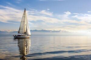 Sailboat drifting lazily on calm lake, its sails billowing in the gentle summer breeze photo