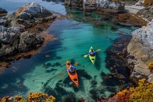 Pair of colorful kayaks resting on the shore, beckoning adventurers to explore hidden coves photo