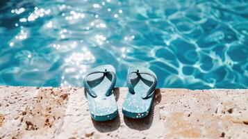 Pair of flip-flops left at the edge of pool, signaling carefree summer day photo