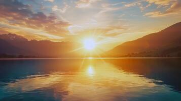 Sunset over tranquil lake, casting warm glow over the water and surrounding landscape photo