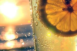 Refreshing glass of lemonade, condensation glistening in the summer heat photo