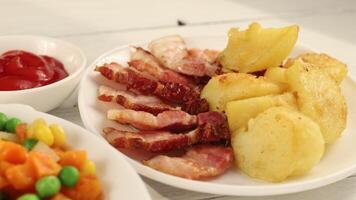 Fried potatoes and bacon. Traditional food. video