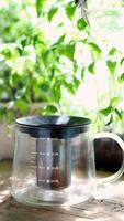 Brew buckwheat tea with boiling water in a transparent teapot. Brew fenugreek in a teapot video