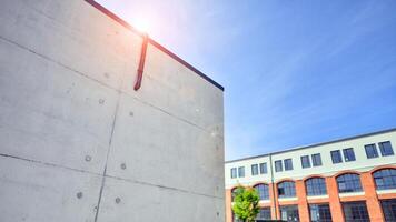 Modern office building with white metallic panel facade and windows. Modern architectural details. photo