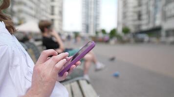 woman use of mobile phone at city 4k video