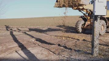 industrial tractor makes a rural road video