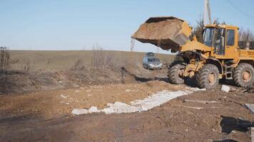 industrial tractor makes a rural road video